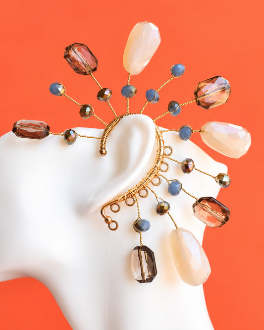 Handmade smoky blue and cream crystal statement ear piece with gold details, Niebla Crystal by Heavenly