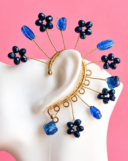 Handmade navy blue beaded flower statement ear piece with gold details, Mar de Flores by Heavenly